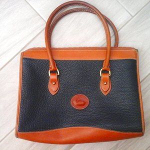 Dooney & Bourke Vintage Black and Tan Satchel Handbag.   Size 9x12x4